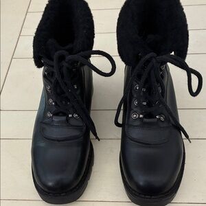 Blondo black leather ankle high boots. Size 8B. Black rubber sole. Worn 1 time.